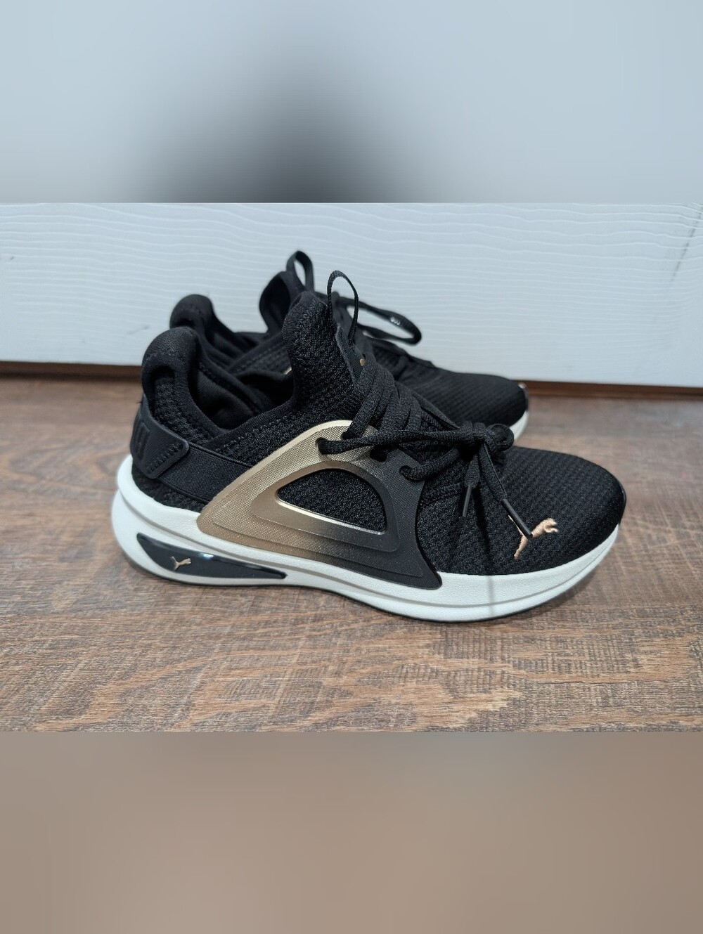 Puma Black Sneakers with Gold Accents